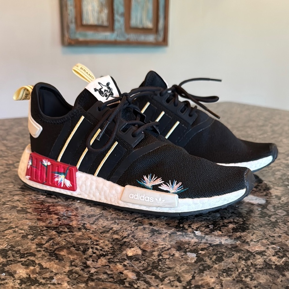 adidas Black Sneakers with Gold Accents and Red Heel Detail